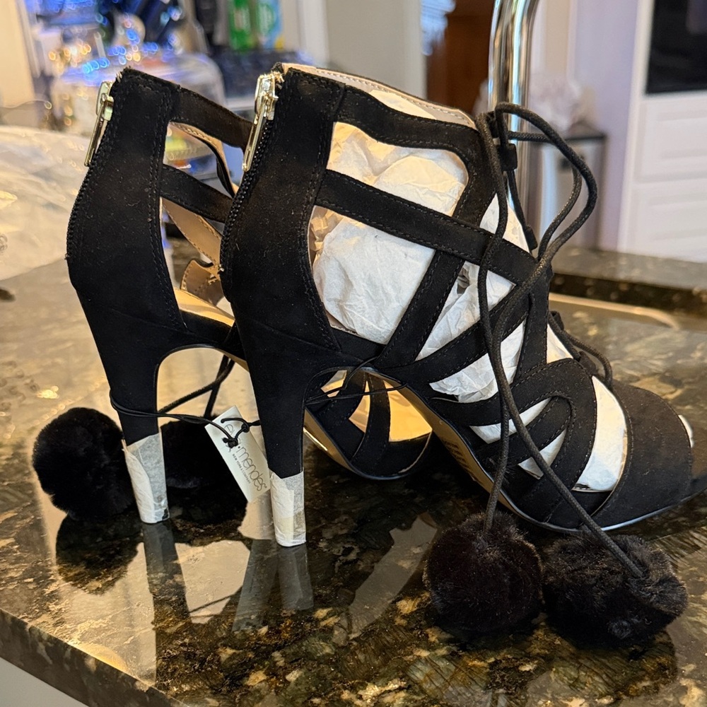 Eva Mendes Black Strappy Heels with Pom Poms